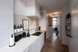 Townhouse Tongeren Center 275m2, 10p - Featured in Designbook