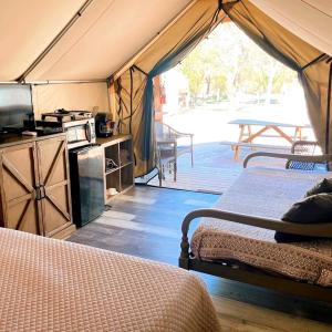 Secluded Safari Tent on San Marcos River - An Adventurous Glamping Vacation near Kingsbury, Texas