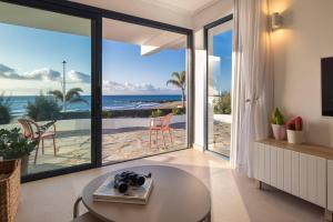 Amapola Palms - recién reformado, frente al mar