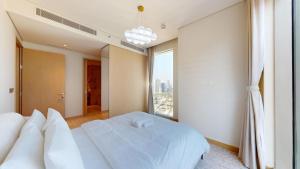 Vacationer Holiday Homes l Modern 2 Bed l Direct Dubai Mall Access l Free Pool, Gym