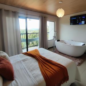 Canto dos Amores Suítes - Banheira de Hidromassagem e vista