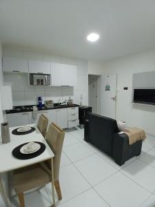 Flat 04 Tranquilo, prático e com ótima localização