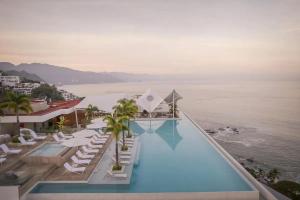 Exclusive Oceanfront Retreat with Resort Amenities