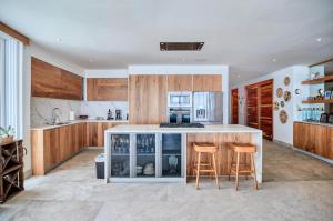 Exclusive Oceanfront Retreat with Resort Amenities