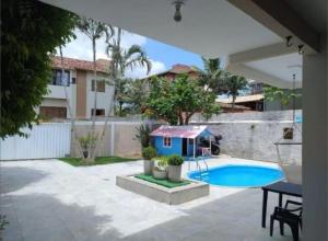 Casa com pisicna Pé na Areia 50m do mar