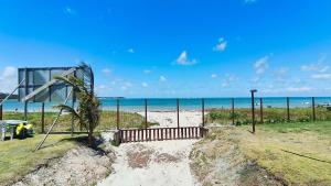 Atlântico Carneiros - Pé na areia próximo da Igrejinha