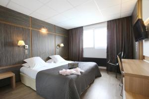 Hotels The Originals Boutique, Hotel Neptune, Montpellier Sud (Inter-Hotel) : photos des chambres