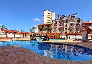 Luxury Oasis in front of La Vela Mall Pool and Sea!