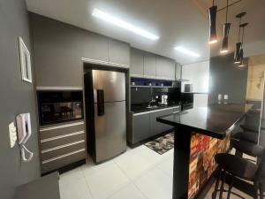 Vista Mar 2 Dorm car condicionado - 2 vagas de Garagem -wi-Fi ate 6 Hospedes