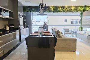 Conforto na Praia Gonzaga Estacionamento Piscina