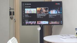 301, 1 minute from Mia Station Exit 5 with Google TV