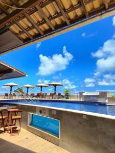 Flat 218 Pipas Bay vista mar com piscina