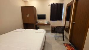 sri selvaas inn