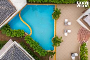 StayVista at Kuhu Natures Resort with BBQ, Pool