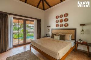 StayVista at Kuhu Natures Resort with BBQ, Pool