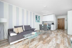 Seaside Apartment with a Swimming Pool and Sauna Close to the Beach in Kołobrzeg by Noclegi Renters