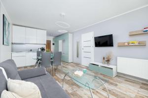 Seaside Apartment with a Swimming Pool and Sauna Close to the Beach in Kołobrzeg by Noclegi Renters