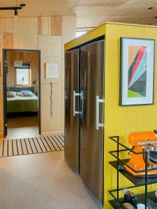 Wooden Home Among Apple Trees With Ocean View