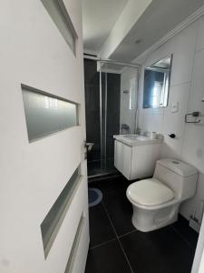 Modern apartment steps from Parque Arauco mall