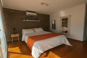 Modern apartment steps from Parque Arauco mall