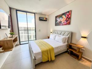 Lujo Caribeño Apartamento con vista al mar y psicina