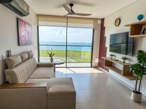 Lujo Caribeño Apartamento con vista al mar y psicina