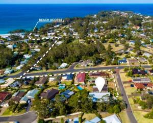 Stylish Sun Soaked Duplex Walk to Beach