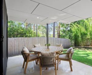 Stylish Sun Soaked Duplex Walk to Beach