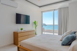 De Lujo con Vista al Mar a Pie de Playa