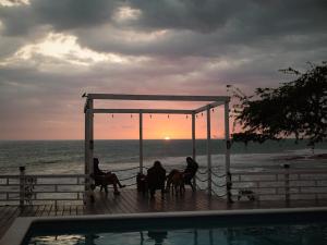 Beachfront villa with pool and staff