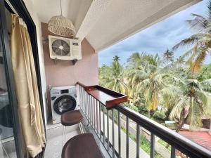 Candolim Beach Studio Apartment with Pool WiFi Balcony and Kitchenette