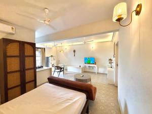 Candolim Beach Studio Apartment with Pool WiFi Balcony and Kitchenette