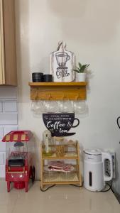 Cozy Three-Bedroom Staycation House with Netflix, Wi-Fi, and Free Parking Garage near SM Caloocan