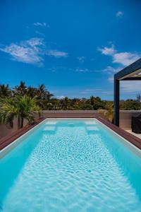 Villa Eden-2 bedrooms with Private Rooftop Terrace & Pool, access to private beachclub, Ki Residences, Pereybère - Managed by KSN