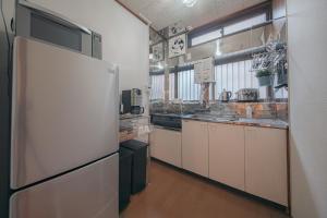 Private house near Umeda, limited to one group per day entire house 6 min walk to Nakazakicho station