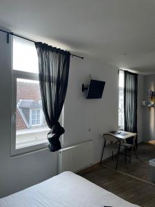 Petit studio quartier Saint-Gery