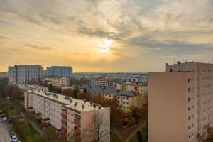 Cozy Apartment for 8 People with Air Conditioning and 2 Parking Spaces by Noclegi Renters