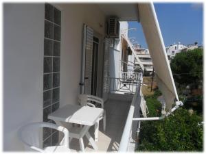 Family Quadruple Room with Balcony and Garden View