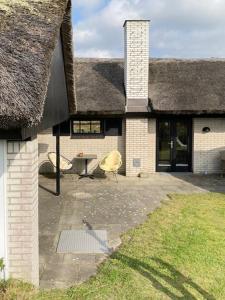 Summerhouse By The Heath Near The North Sea