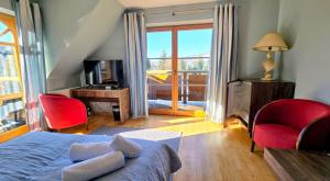 Domek za Strugiem - pokoje i apartamenty