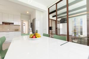 Sea Breeze Jarea by Escape Home