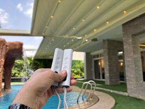 7 BR Smart House with Heated Pool, Waterfall, Garden