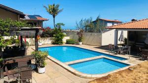 Casa em condominio proximo ao beach park