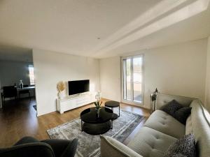 3-Zimmer-Apartment mit Terrasse, 5 Min zu Bahn & Shops