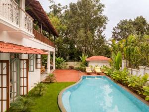 La Dona by The Blue Kite - 4BHK Private Pool Villa in Assagao with Garden, Balcony, Caretaker & Spacious Living Area
