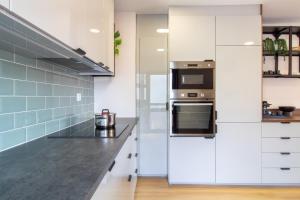Stylish 2BR Near Beach & Metro by LovelyStay