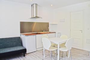 Appartements Maison La Douane - Comprends nettoyage professionnel et le linge : photos des chambres