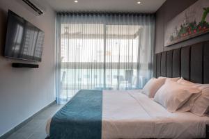 Tres habitaciones - Vista al Mar