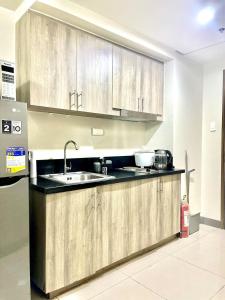 Queen Bed with Coffee Bar and Fast Wi-Fi at S Residences