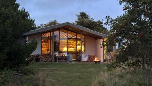 Summer House With Fields And Fjord Views